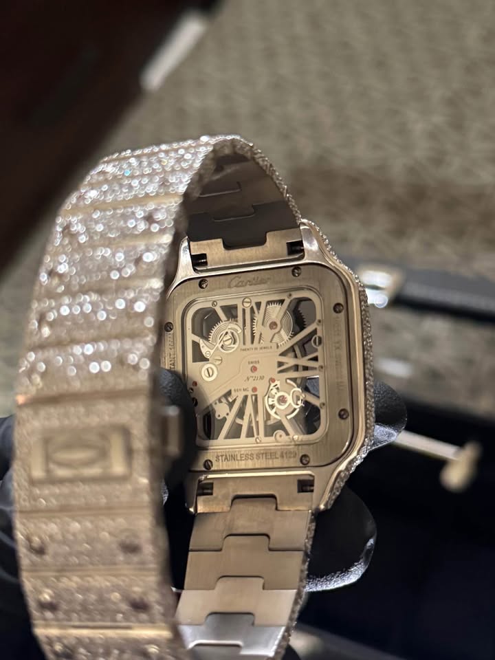 High-end Cartier iced skeleton bustdown watch crafted with Moissanite lab diamonds